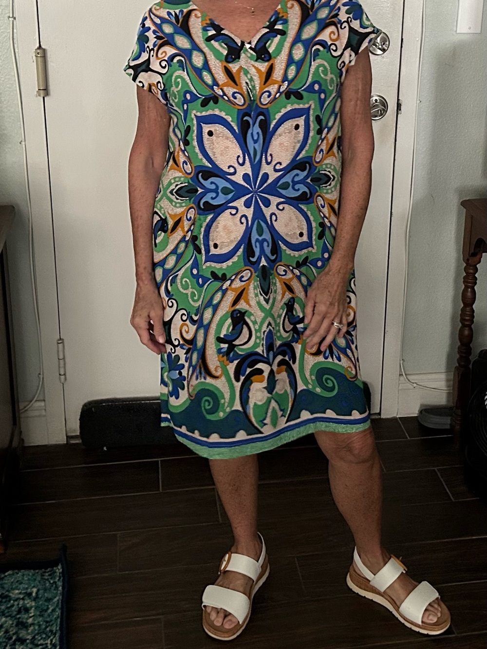Green and blue print dress. Shown on a person who is 5 foot one.